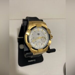 32’ degrees Gold Tone white dial Automatic Black Rubber band preowned